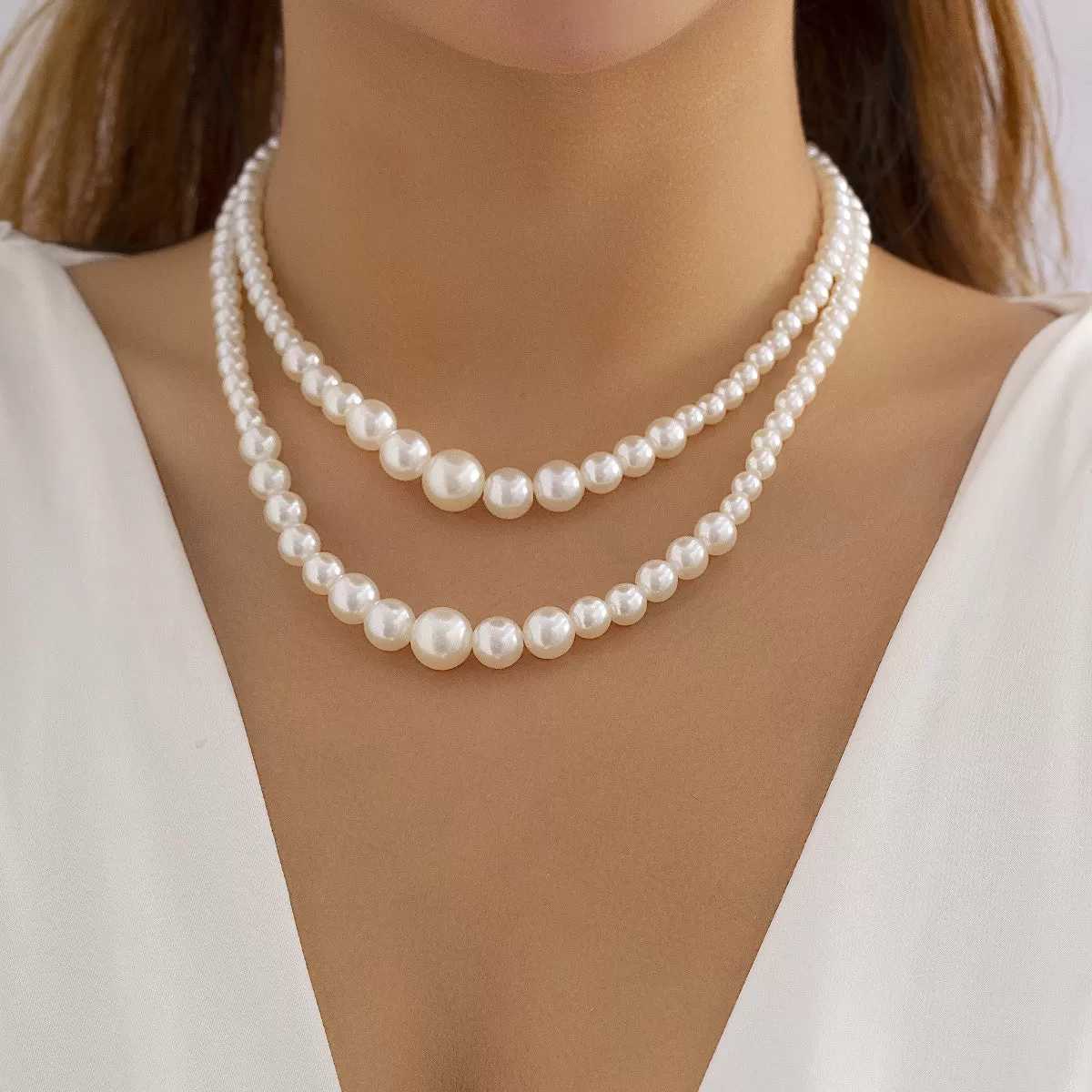 2-Piece Pearl Beading Set: Add a Touch of Elegance to Your Look with These Trendy Jewelry Accessories!